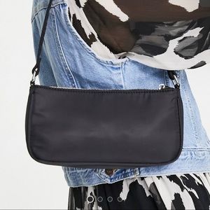 Slim black shoulder bag in recycled nylon